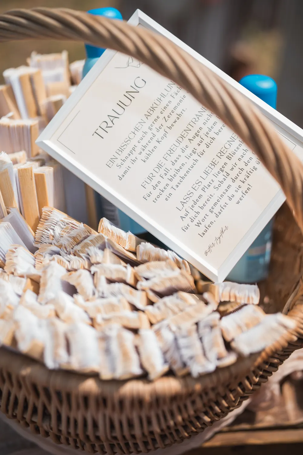 Basket with order-of-service booklets for the ceremony.